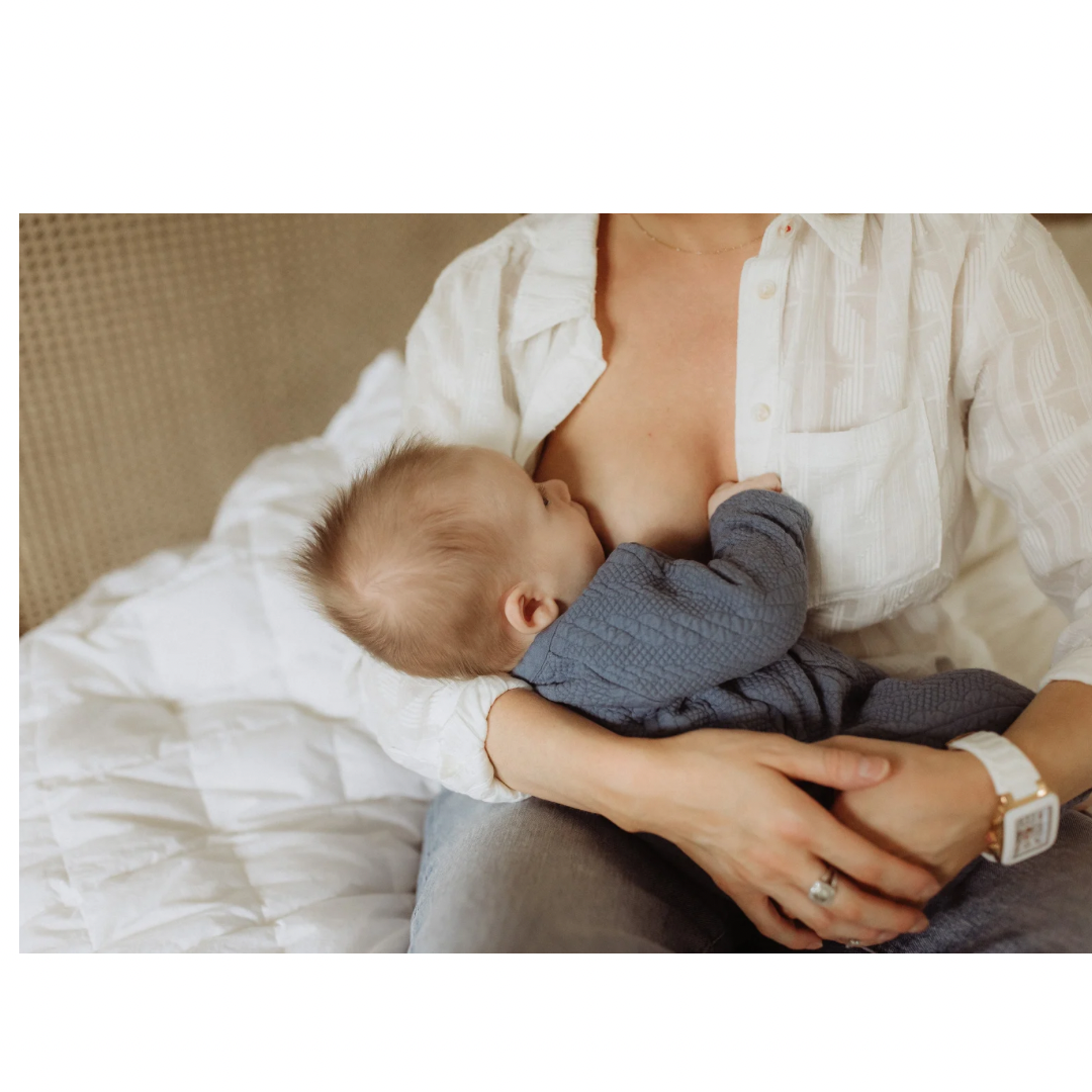 A mother breastfeeding her baby in a peaceful setting, promoting bonding and nourishment.